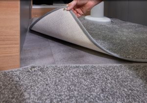 Bailey Adamo Dove Grey; split section loose fit drop in carpets above textured finished durable floor vinyl